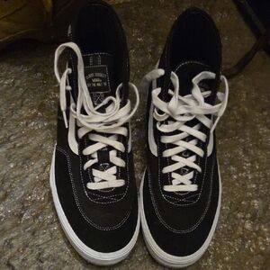 Vans Black and White High-Top Sneakers